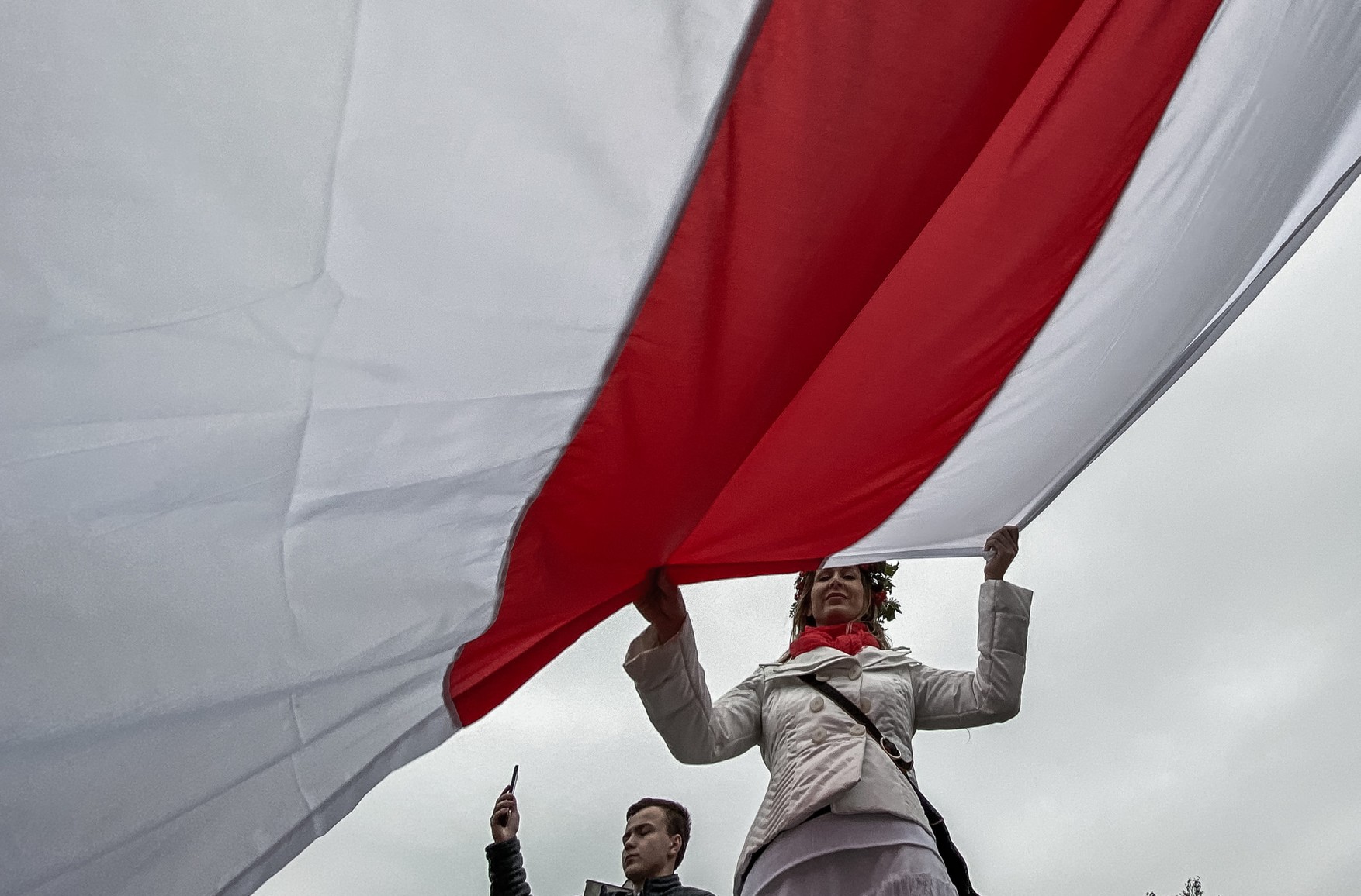 Затриману на Московському марафоні за біло-червоно-білий прапор Білорусі оштрафували на 15 тисяч рублів